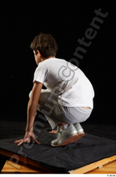 Whole Body Man White Sports Shirt T shirt Sweatsuit Kneeling Studio photo references